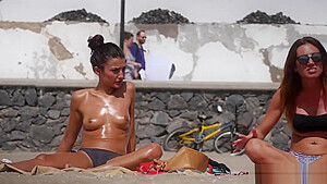 Horny Tanned Babe With Pierced Nipple Filmed On Beach By Voyeur...