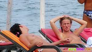 Amateur Bikini Girls Beach Showing Their Open Legs...