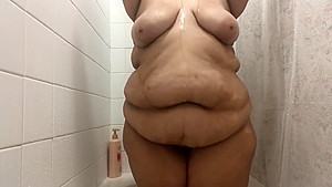 Latina bbw showers and plays with...